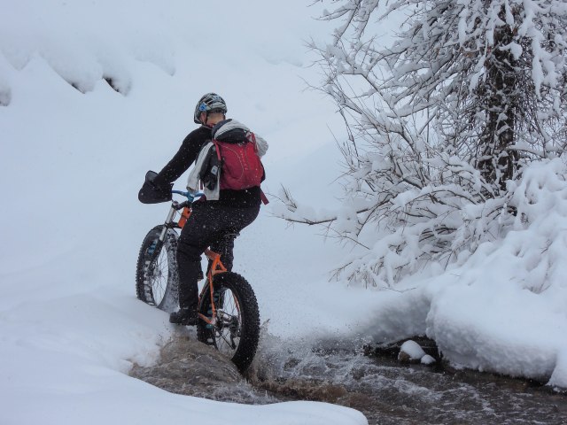 Alex showing how to cross a cold creek, on his 9:Zero:7 with Bud and Lou tires.